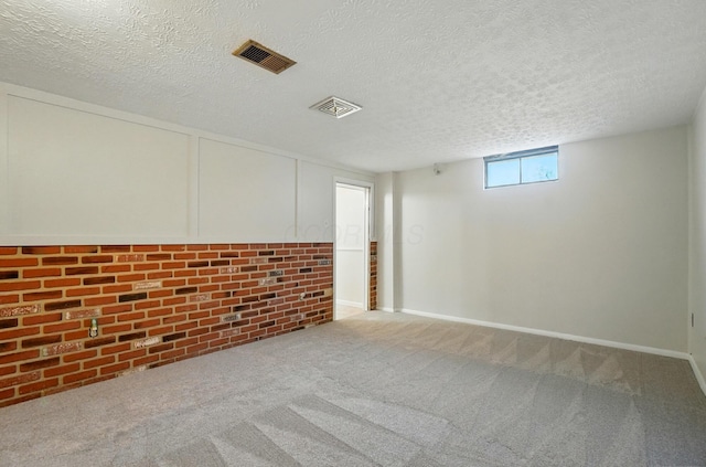 1574 River Bend Rd, Columbus, OH 43223 - below grade area with carpet and a textured ceiling