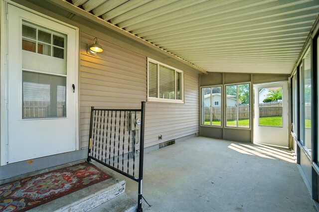 1574 River Bend Rd, Columbus, OH 43223 - unfurnished sunroom featuring lofted ceiling
