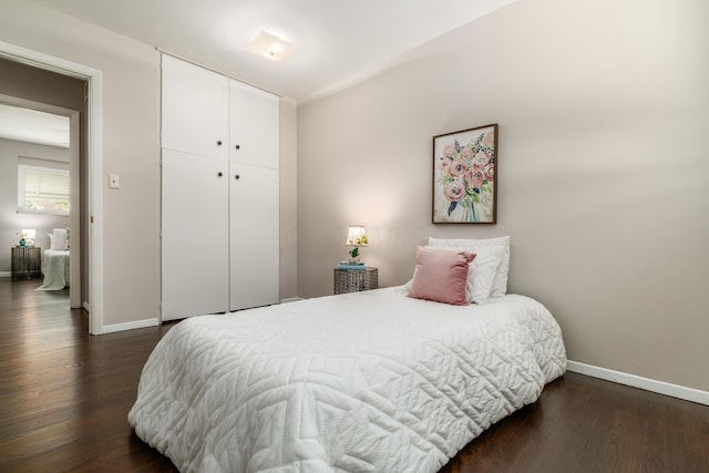 1276 Bryson Rd, Columbus, OH 43224 - bedroom with dark wood-type flooring and a closet