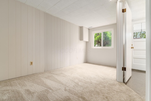 1276 Bryson Rd, Columbus, OH 43224 - carpeted spare room featuring wooden walls
