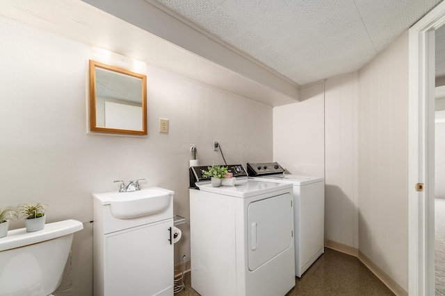 1276 Bryson Rd, Columbus, OH 43224 - laundry room featuring separate washer and dryer
