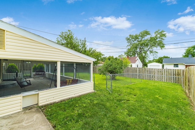 1276 Bryson Rd, Columbus, OH 43224 - fenced backyard with a sunroom
