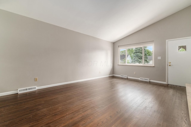 1276 Bryson Rd, Columbus, OH 43224 - empty room with lofted ceiling and dark wood finished floors