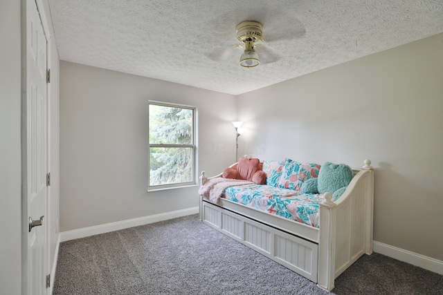 5983 Epernay Way, Galloway, OH 43119 - bedroom featuring carpet floors, a textured ceiling, and ceiling fan