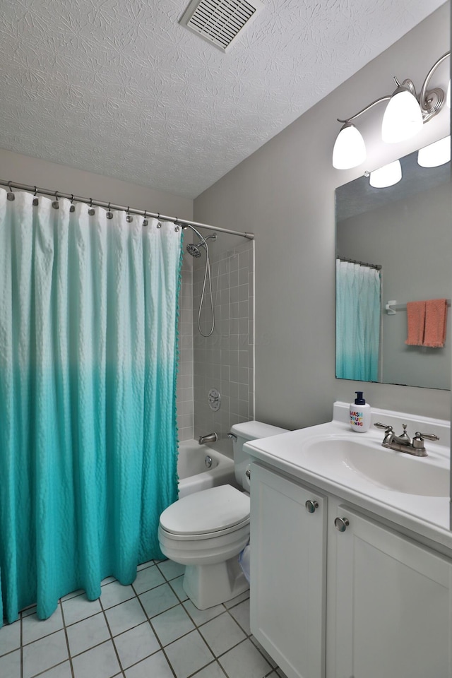 5983 Epernay Way, Galloway, OH 43119 - bathroom with a textured ceiling, vanity, shower / tub combo with curtain, and tile patterned flooring