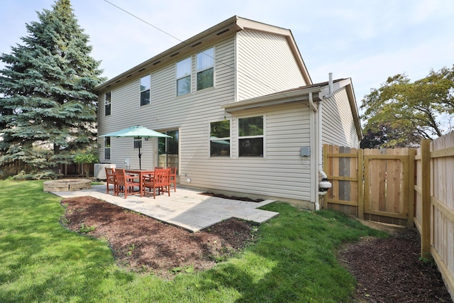 5983 Epernay Way, Galloway, OH 43119 - back of house with a patio area and a fenced backyard