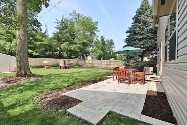 5983 Epernay Way, Galloway, OH 43119 - fenced backyard with a patio area