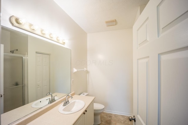 147 Shadymere Ln, Columbus, OH 43213 - bathroom with vanity, an enclosed shower, a textured ceiling, and a closet