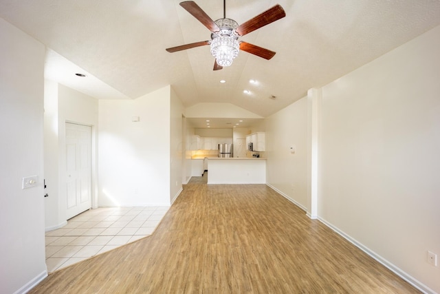 147 Shadymere Ln, Columbus, OH 43213 - unfurnished living room with ceiling fan, lofted ceiling, light wood-type flooring, and recessed lighting