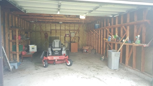 103 Center St, Waldo, OH 43356 - garage featuring a garage door opener