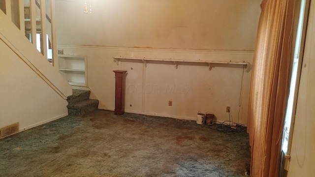 103 Center St, Waldo, OH 43356 - below grade area featuring dark carpet and stairs