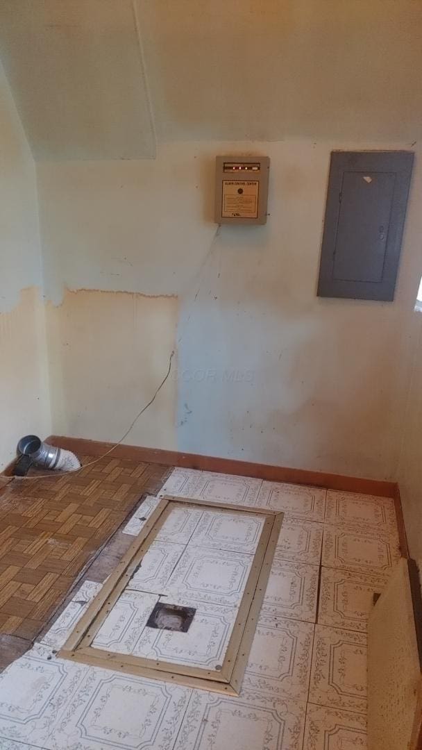 103 Center St, Waldo, OH 43356 - spare room with electric panel and baseboards