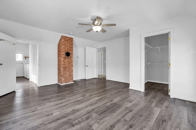 212 S Pickaway St, Circleville, OH 43113 - unfurnished bedroom with wood finished floors, a spacious closet, a closet, and ceiling fan