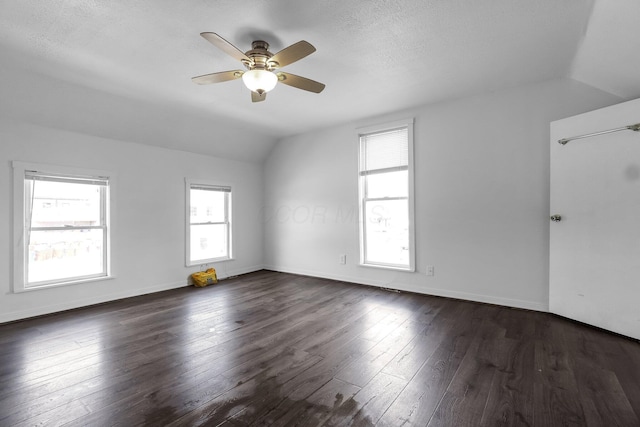 212 S Pickaway St, Circleville, OH 43113 - unfurnished room featuring vaulted ceiling, a ceiling fan, and dark wood-style floors
