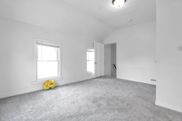 212 S Pickaway St, Circleville, OH 43113 - carpeted empty room with lofted ceiling and baseboards