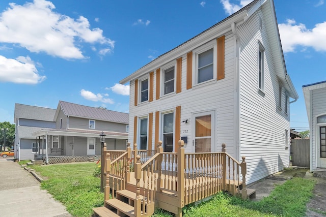 212 S Pickaway St, Circleville, OH 43113 - view of front facade with a front lawn