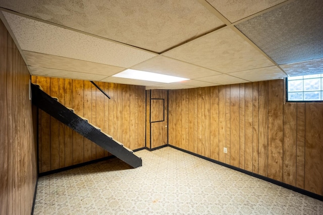 83 Tarryton Ct W, Columbus, OH 43228 - basement with a drop ceiling and wood walls