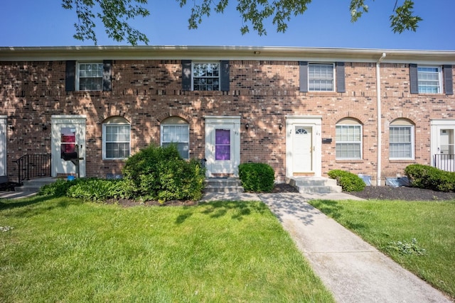 83 Tarryton Ct W, Columbus, OH 43228 - multi unit property with brick siding and a front lawn