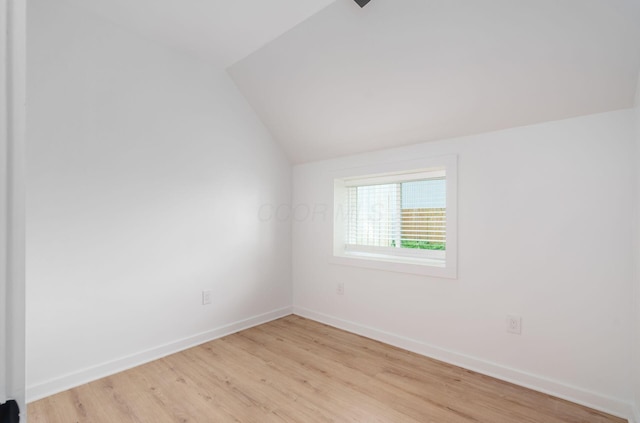 165 W Jersey St, Johnstown, OH 43031 - unfurnished room with vaulted ceiling and light wood-style flooring