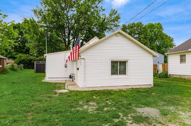 165 W Jersey St, Johnstown, OH 43031 - rear view of property with a lawn