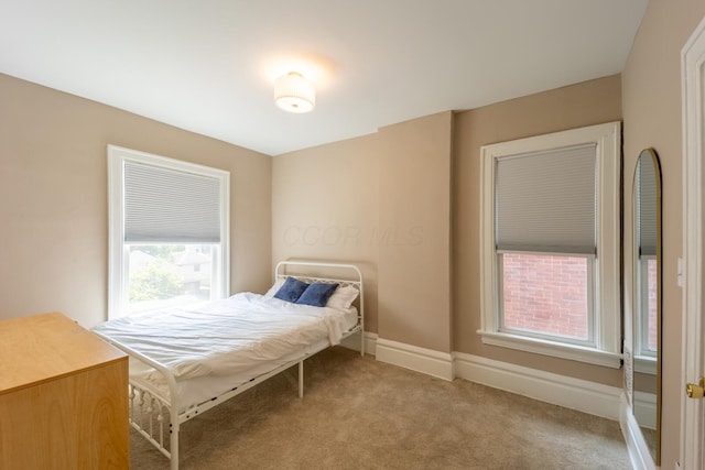56 S Champion Ave, Columbus, OH 43205 - carpeted bedroom featuring baseboards