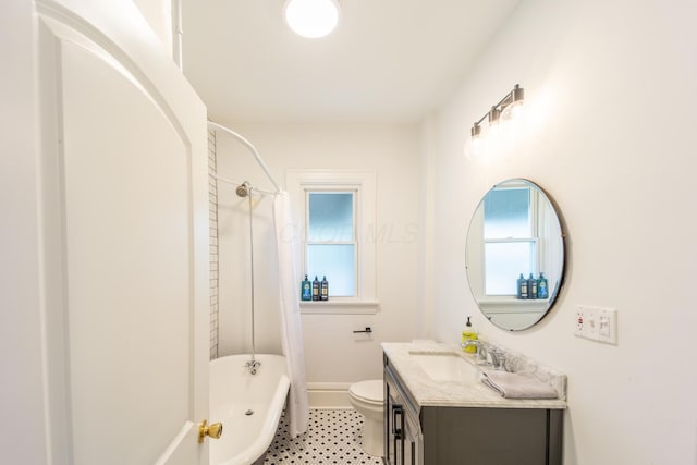 56 S Champion Ave, Columbus, OH 43205 - bathroom featuring vanity, shower / tub combo, and tile patterned flooring