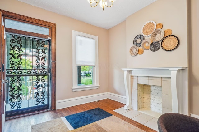 56 S Champion Ave, Columbus, OH 43205 - entryway featuring wood finished floors and a chandelier