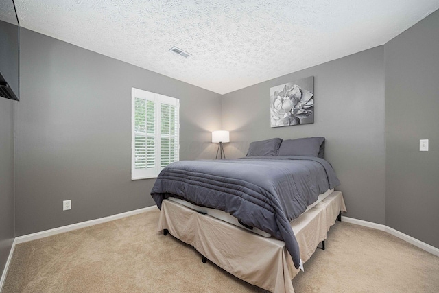 6838 Evergreen Cir, Dayton, OH 45424 - bedroom featuring carpet flooring and a textured ceiling