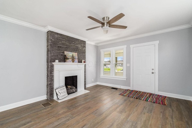 670-672 E Jenkins Ave, Columbus, OH 43207 - unfurnished living room featuring a fireplace, wood finished floors, ceiling fan, and ornamental molding