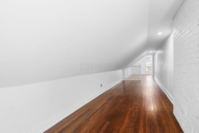 670-672 E Jenkins Ave, Columbus, OH 43207 - additional living space with lofted ceiling and dark wood-style flooring
