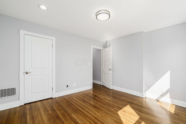 670-672 E Jenkins Ave, Columbus, OH 43207 - unfurnished bedroom featuring wood finished floors