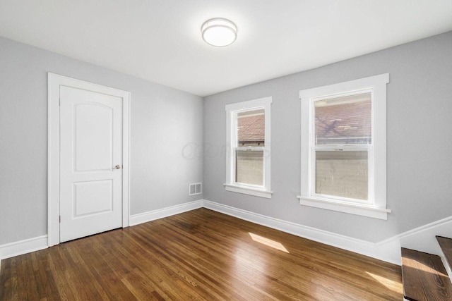 670-672 E Jenkins Ave, Columbus, OH 43207 - spare room with baseboards and wood finished floors