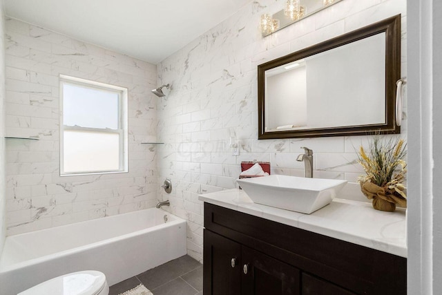 670-672 E Jenkins Ave, Columbus, OH 43207 - bathroom featuring vanity, tile patterned floors, shower / bathtub combination, and tile walls