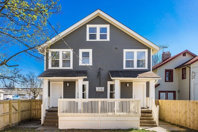670-672 E Jenkins Ave, Columbus, OH 43207 - view of front of house featuring covered porch and a shingled roof