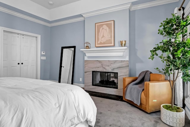 3917 Tarrington Ln, Columbus, OH 43220 - bedroom with carpet flooring, crown molding, and a premium fireplace