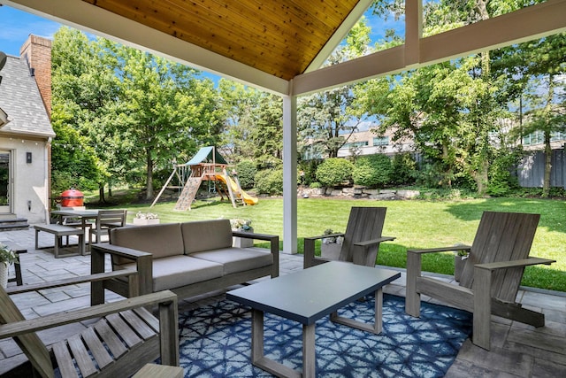 3917 Tarrington Ln, Columbus, OH 43220 - fenced backyard with a patio, an outdoor hangout area, and a playground