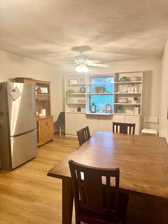 158 Kennedy Blvd, Leesburg, OH 45135 - dining room with a ceiling fan and light wood-style flooring