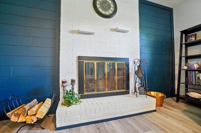 248 Grandview Ave, Delaware, OH 43015 - detailed view of wood finished floors and a glass covered fireplace