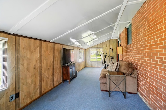 248 Grandview Ave, Delaware, OH 43015 - unfurnished room with wood walls, brick wall, and carpet floors