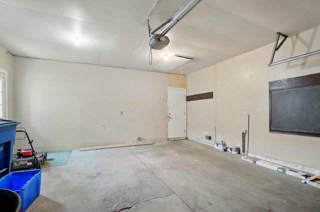 248 Grandview Ave, Delaware, OH 43015 - garage featuring a garage door opener