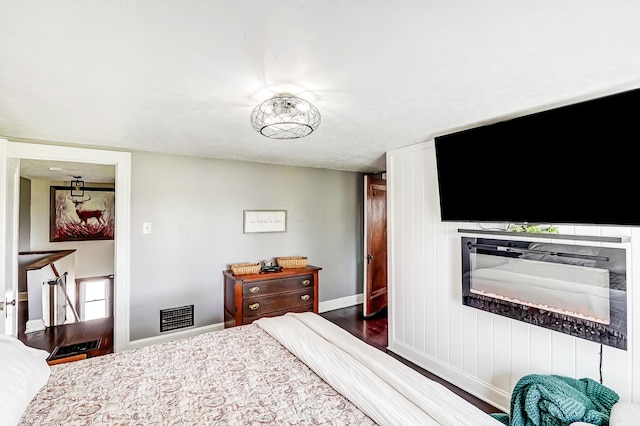 6997 State Route 734, Jamestown, OH 45335 - bedroom featuring baseboards and dark wood-type flooring