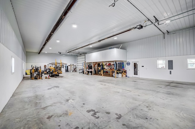 6997 State Route 734, Jamestown, OH 45335 - garage featuring electric panel and a garage door opener