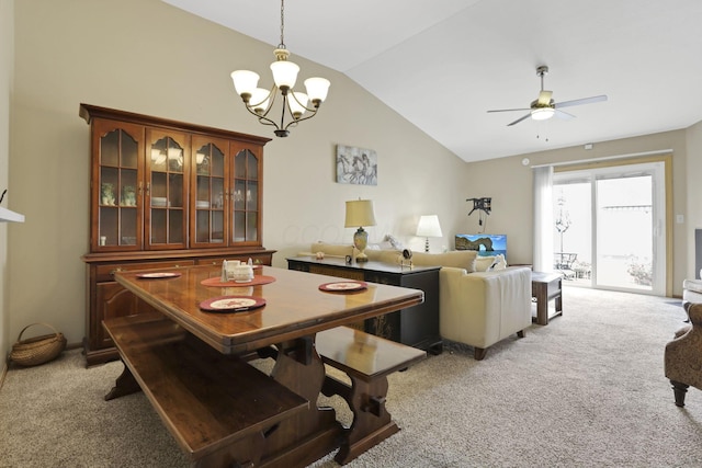 1104 Arbor Oaks Ln, Galloway, OH 43119 - dining space featuring light carpet, lofted ceiling, a chandelier, and ceiling fan