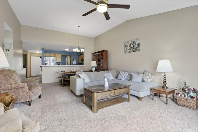 1104 Arbor Oaks Ln, Galloway, OH 43119 - living room with light carpet, a ceiling fan, vaulted ceiling, and a chandelier