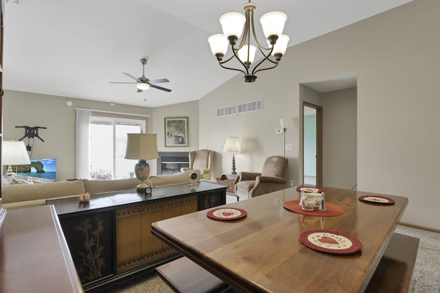 1104 Arbor Oaks Ln, Galloway, OH 43119 - carpeted dining space featuring a ceiling fan, a chandelier, and lofted ceiling