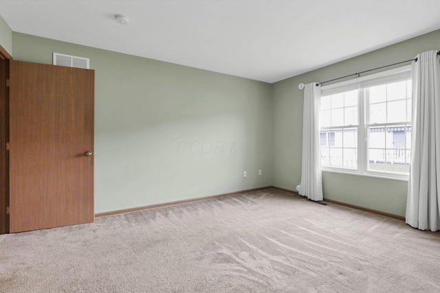 1104 Arbor Oaks Ln, Galloway, OH 43119 - spare room with a smoke detector and carpet floors