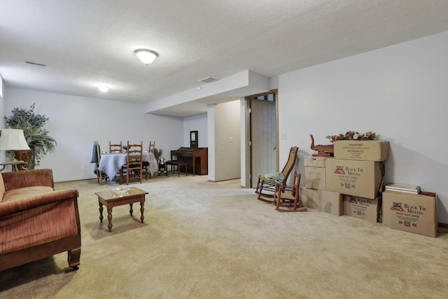 1104 Arbor Oaks Ln, Galloway, OH 43119 - living room with carpet flooring and a textured ceiling