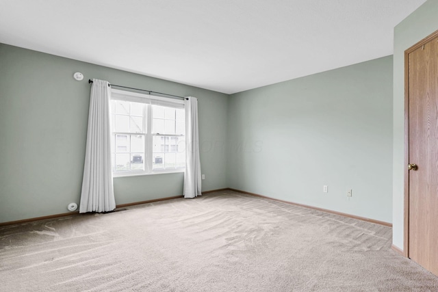 1104 Arbor Oaks Ln, Galloway, OH 43119 - spare room with carpet floors and baseboards