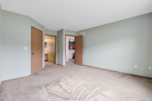 1104 Arbor Oaks Ln, Galloway, OH 43119 - unfurnished bedroom featuring light colored carpet and baseboards