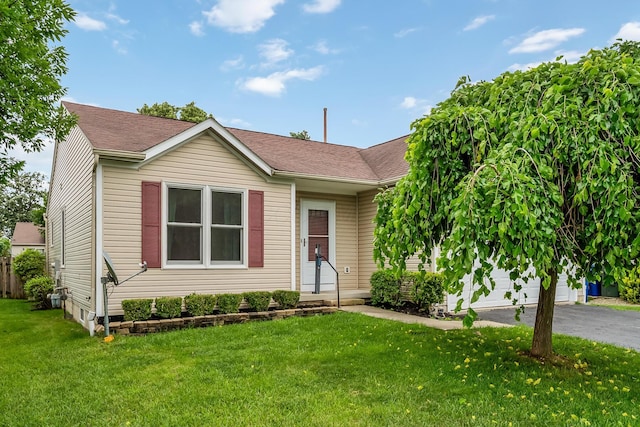 1344 Bluffton Ct, Columbus, OH 43228 - view of front of home with a front lawn, driveway, a garage, and roof with shingles
